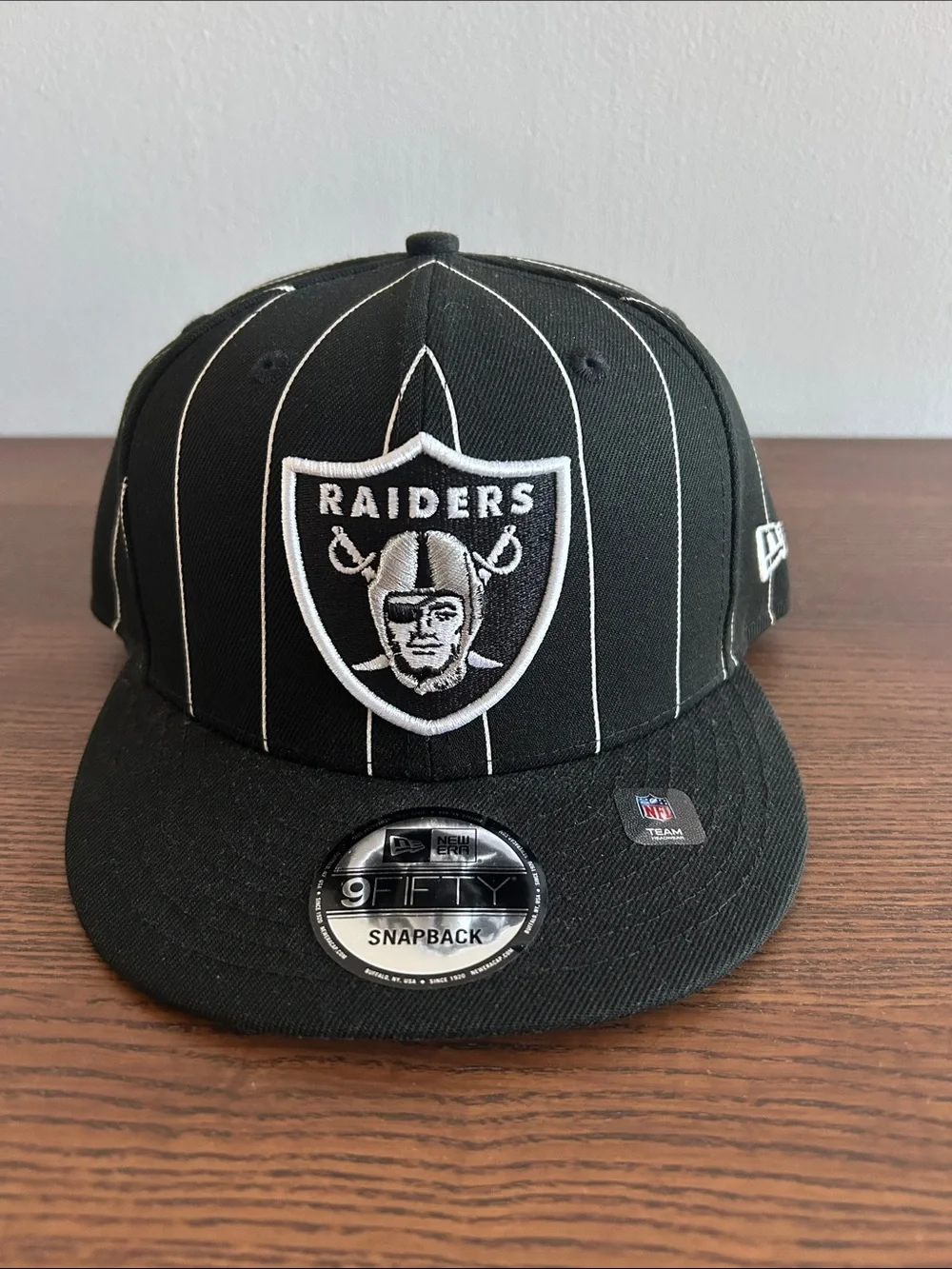 New Era Black & White Raiders Pinstripe Snapback Hat